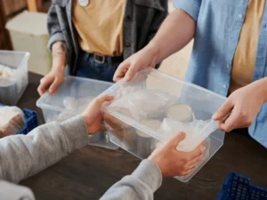 Volunteers process food donations