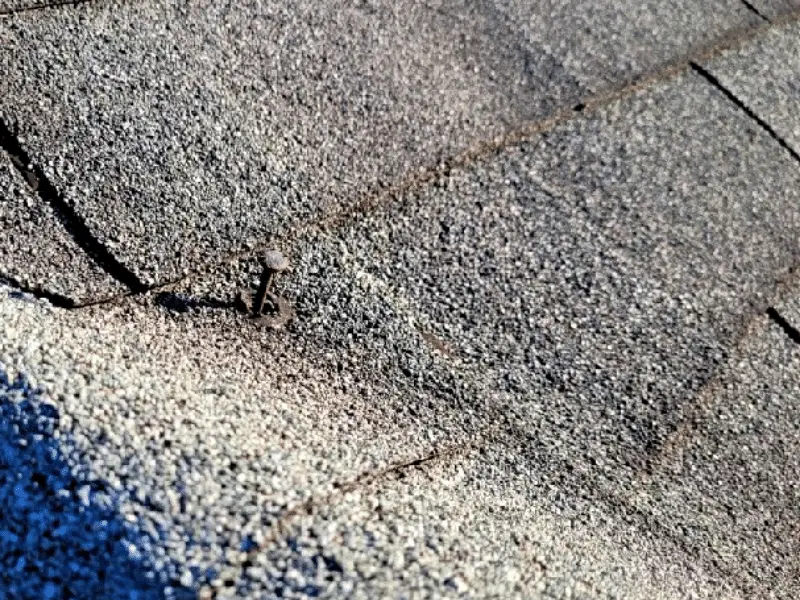 Roof nail pop - Artisan Quality Roofing Roof nail pops on roof - cause roof leaks