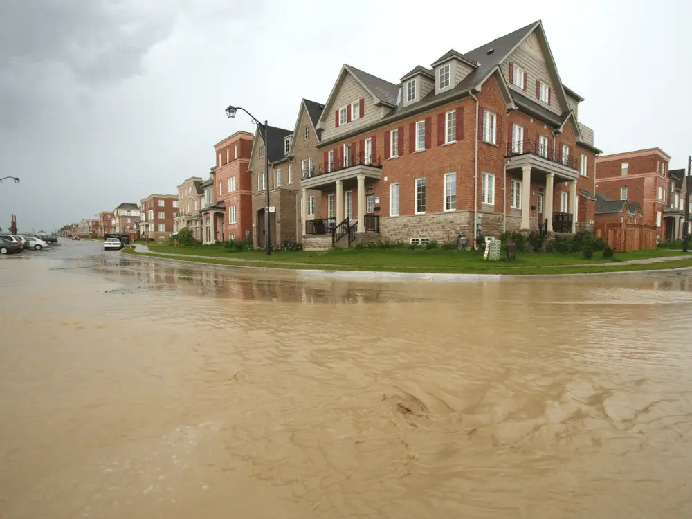 roof shingles with wind damage Flooded neighborhood - example of hurricanes in Raleigh