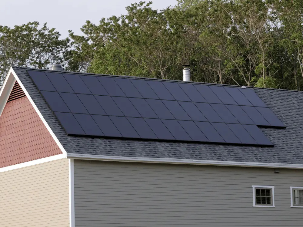 Asphalt shingle roof with solar panels - Artisan Quality Roofing Example of solar panels on your roof - shingle roofing system